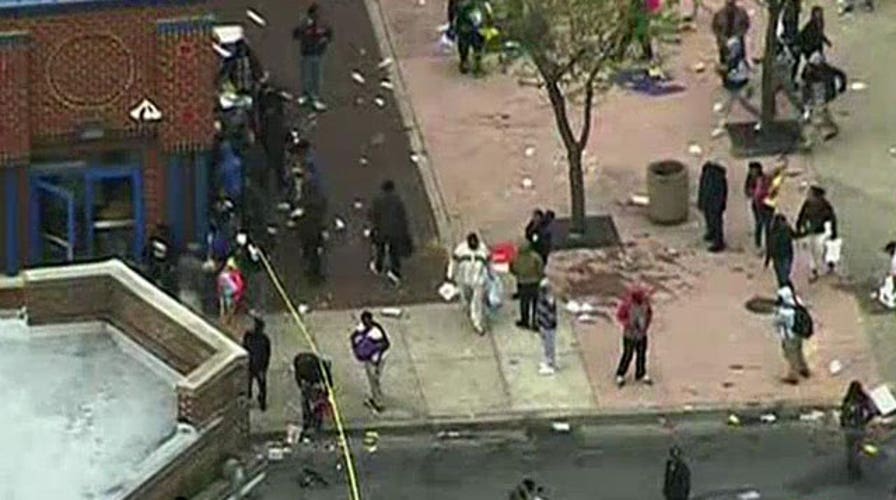 Baltimore police: 7 officers injured, one 'unresponsive'