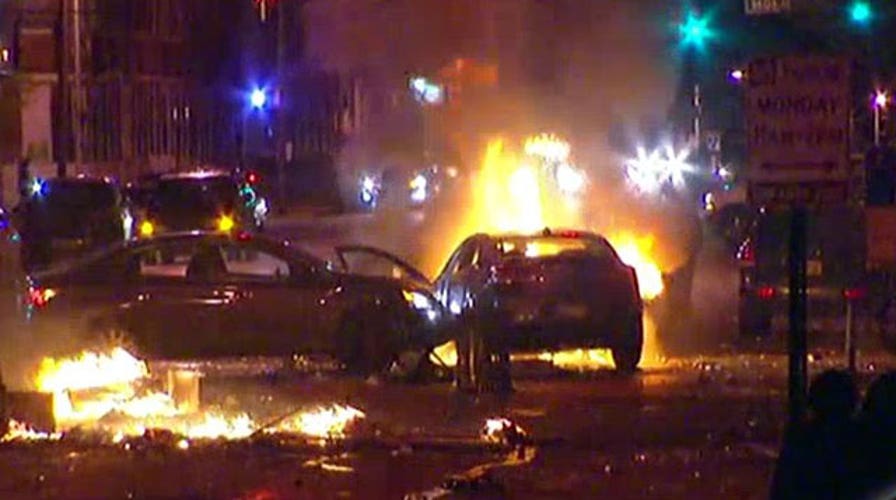 Police attempt to restore order in Baltimore amid riots
