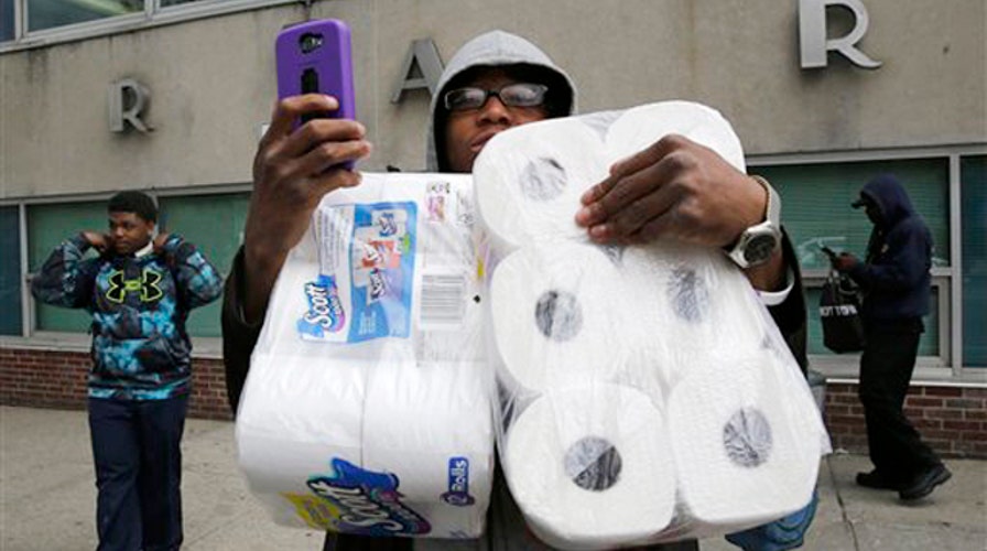 Ferguson store owner reacts to Baltimore riots