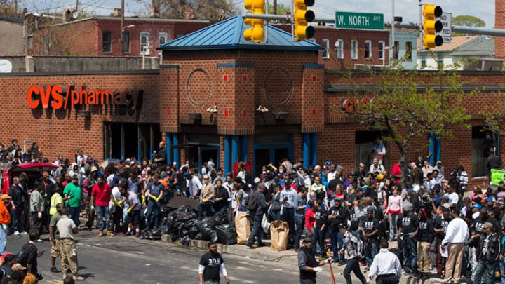 Baltimore remains calm after first night of mandatory curfew