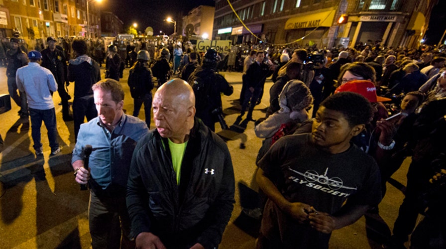 Baltimore curfew lifted after quieter night of protests