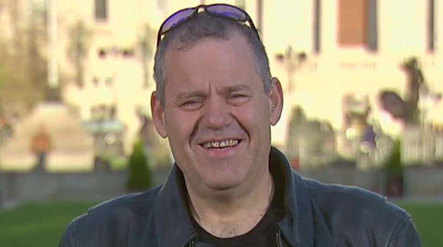 Owner stands guard outside Baltimore bar all night