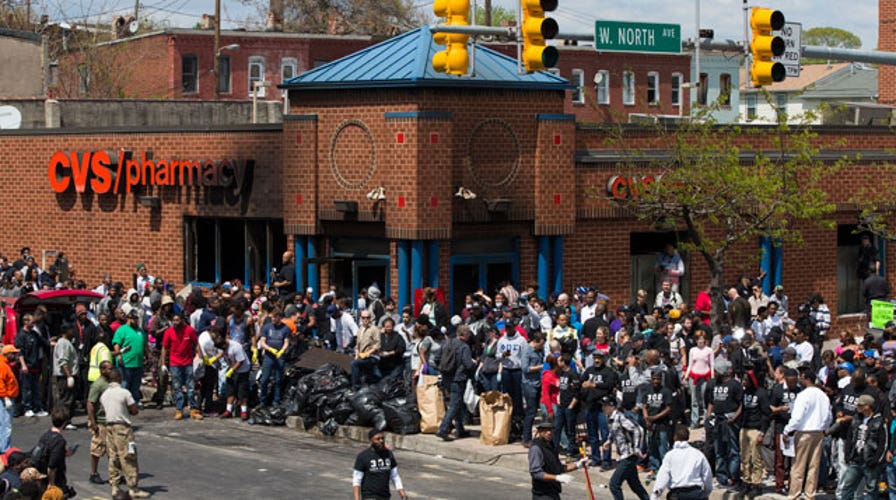 Baltimore remains calm after first night of mandatory curfew