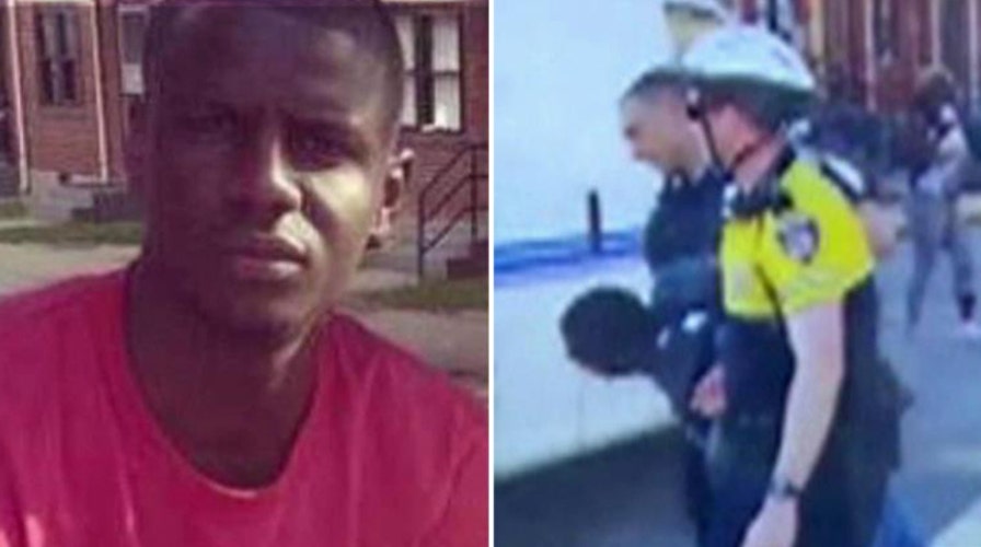 Report: Prisoner in van says Gray tried to hurt himself