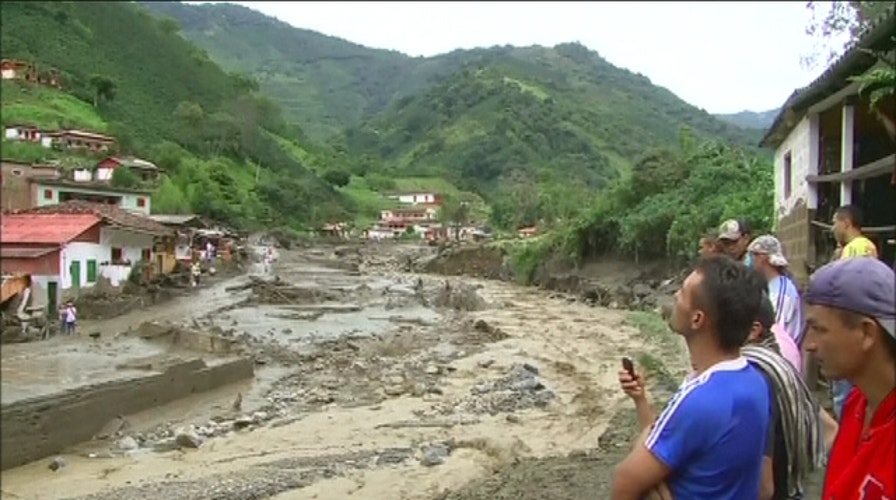 Mudslide sweeps away homes, dozens killed in Colombia