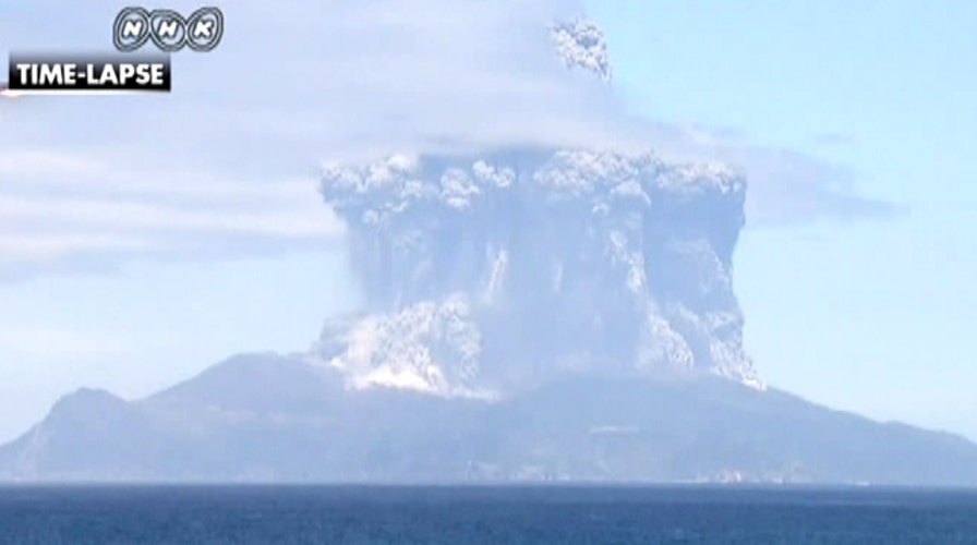 Volcano spews clouds of black ash, Japanese island evacuated