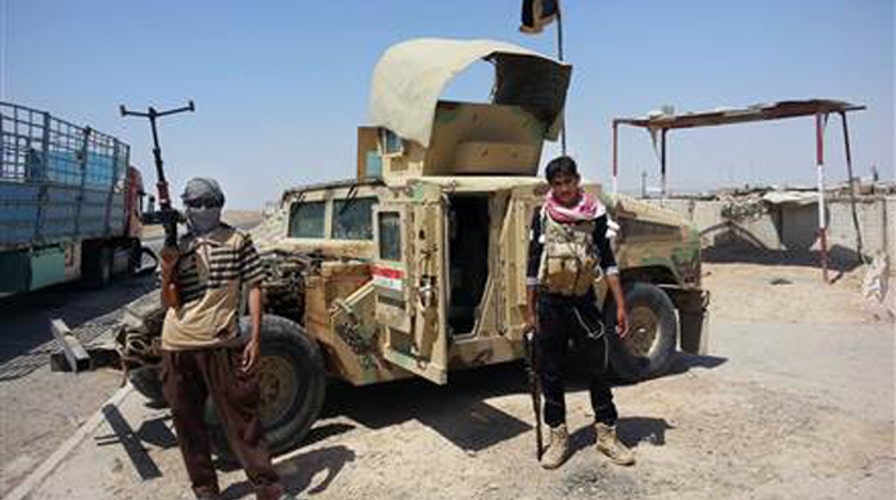 Iraq PM: Forces lost US-paid  humvees when Mosul fell