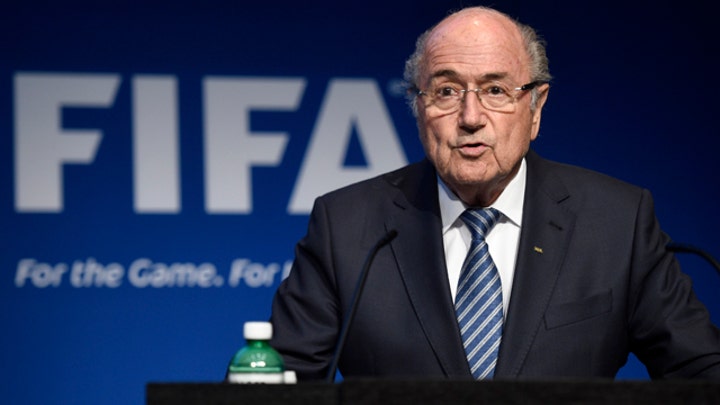 Sepp Blatter resigns as FIFA president