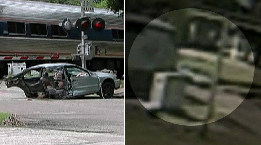 Train vs car: Vehicle ripped in half during horrifying crash
