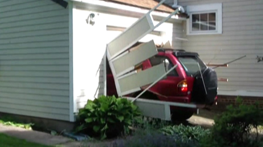 Grandpa drives through garage door as part of bucket list