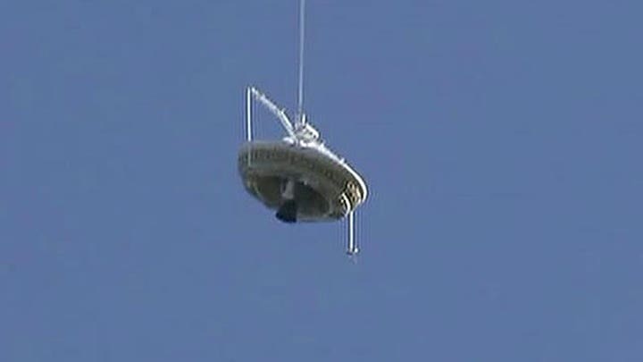 NASA launches 'flying saucer' from Hawaii for test flight