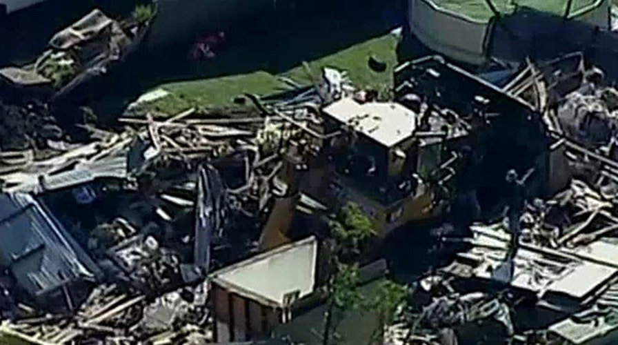 Stolen bulldozer plows into Australian family's home