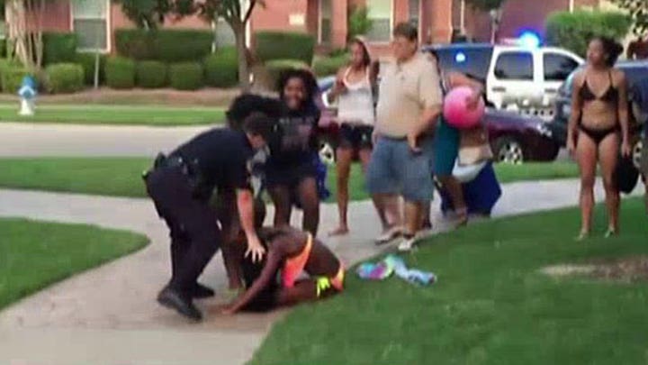 Texas cop resigns following release of pool party video