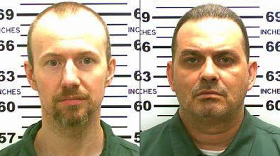 Report: Escaped killers tracked to town 30 miles from prison