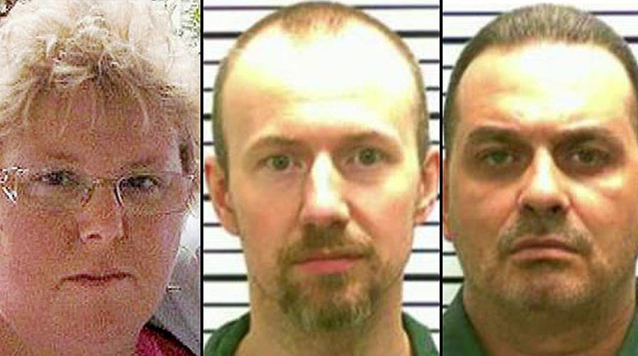 Prison worker arrested, charged with helping killers escape
