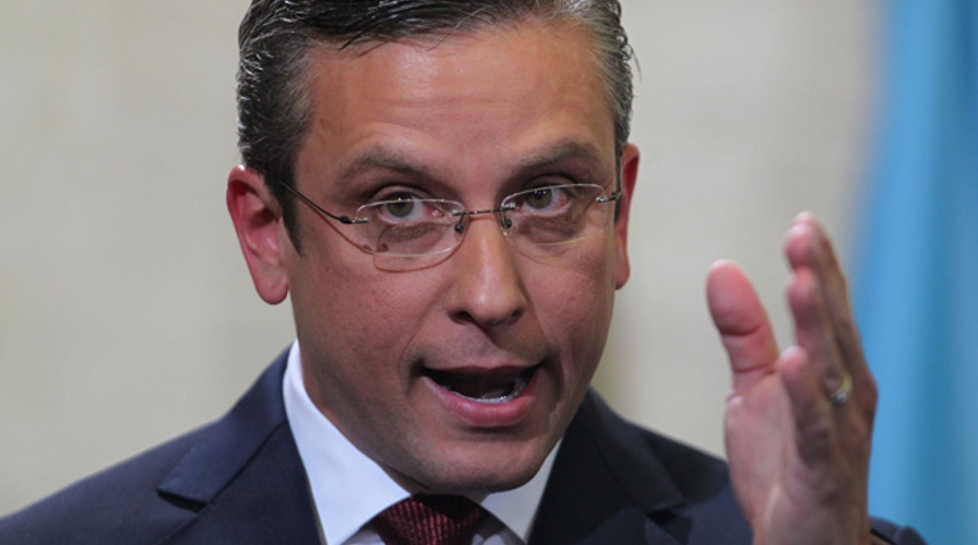 Midday Market Report: Puerto Rico debt crisis