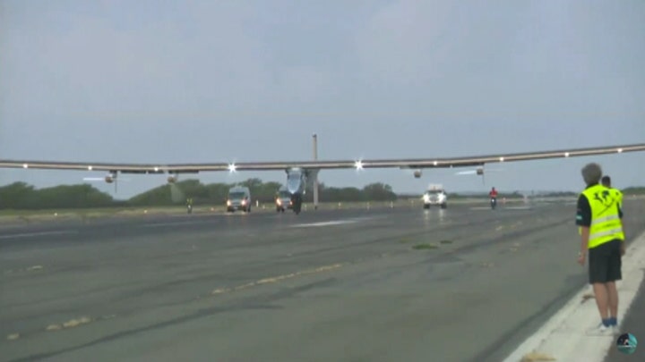 Solar-powered plane lands in Hawaii after flight from Japan