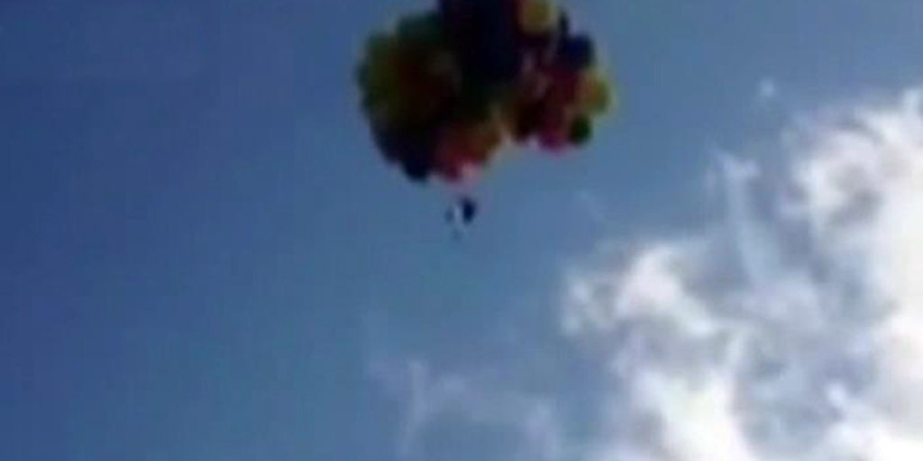 Man flies over Calgary in chair tied to 110 helium balloons Fox News