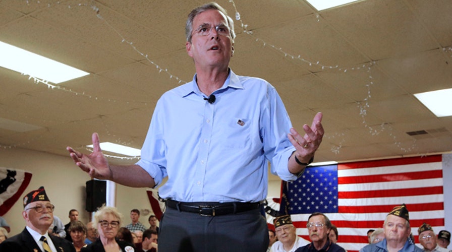 Bush strategy in focus with news of record fundraising haul