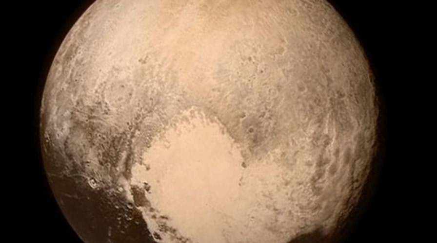 NASA's New Horizons spacecraft makes historic flyby of Pluto