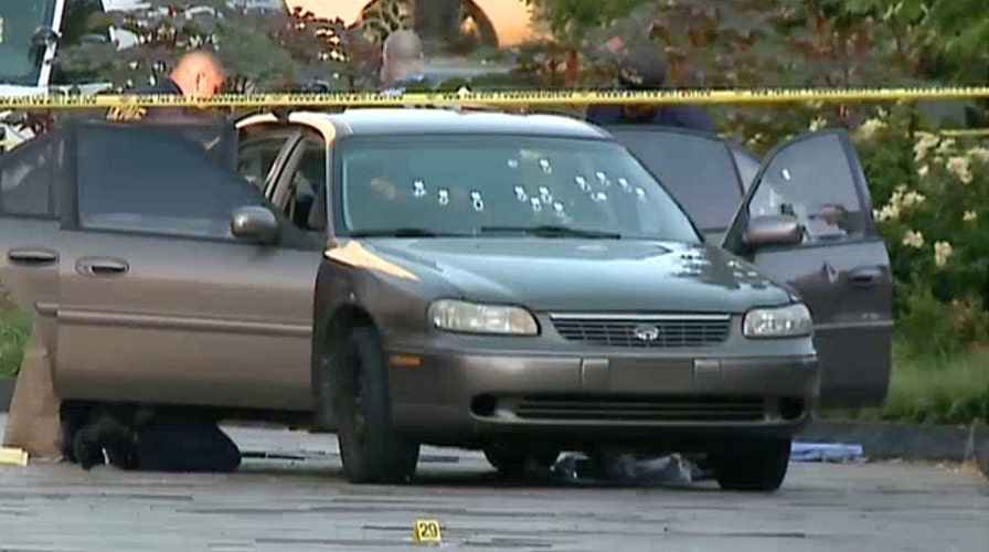 Manhunt underway for suspects who shot St. Louis cop