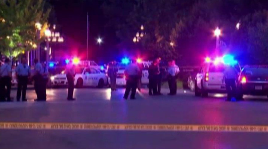Manhunt for suspects who shot St. Louis cop