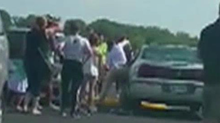 Heroic woman saves toddler locked in sweltering car