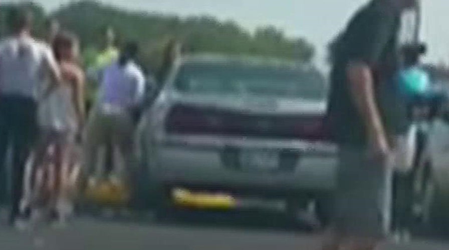 Woman uses trailer hitch to save toddler trapped in hot car