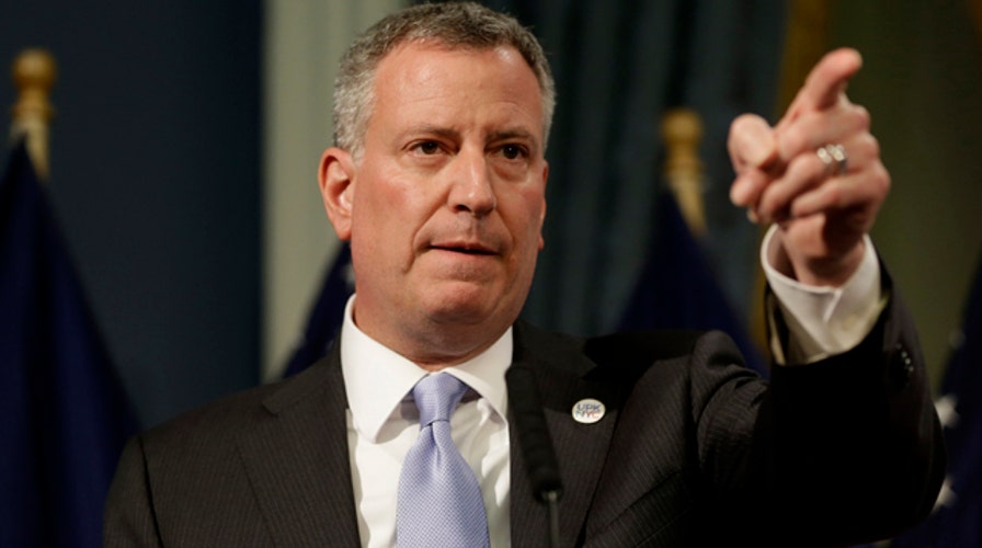 NYC Mayor De Blasio drops plan to cap Uber growth