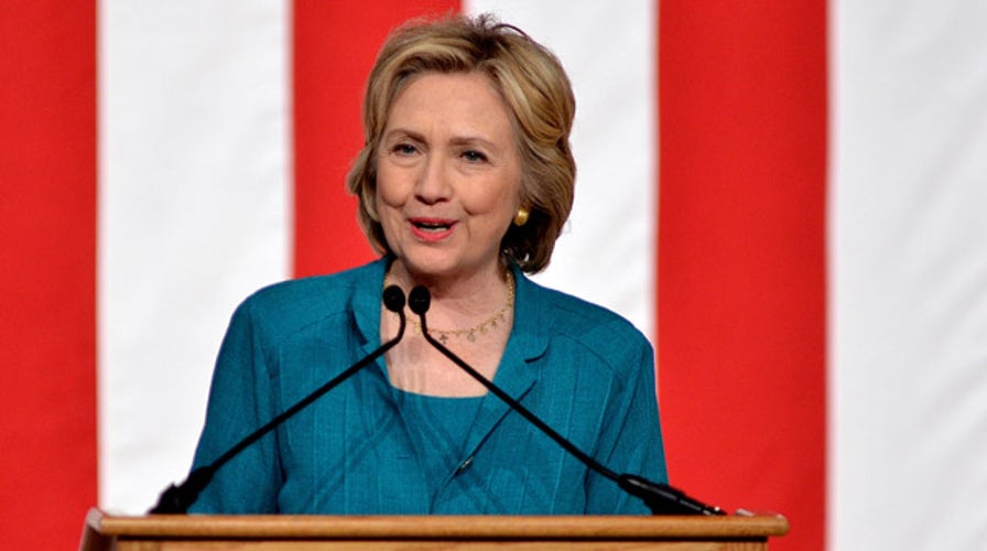 Clinton to launch first wave of TV ads amid Biden rumors