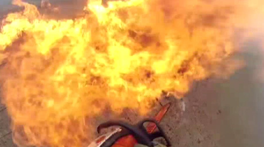Into the flames: Firefighter's bravery caught on camera
