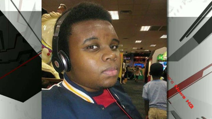 Ferguson demonstrators remember Michael Brown