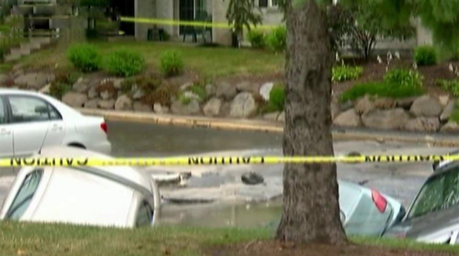 Neighborhood evacuated after massive sinkhole opens up