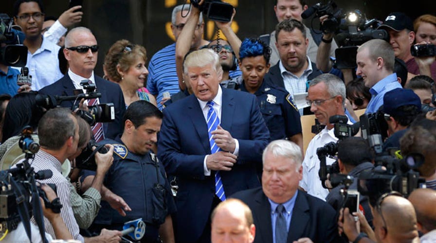 Media circus as Donald Trump reports for jury duty