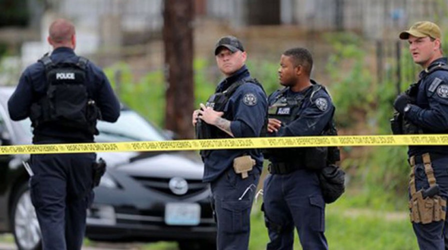 St. Louis police use tear gas on crowd protesting shooting