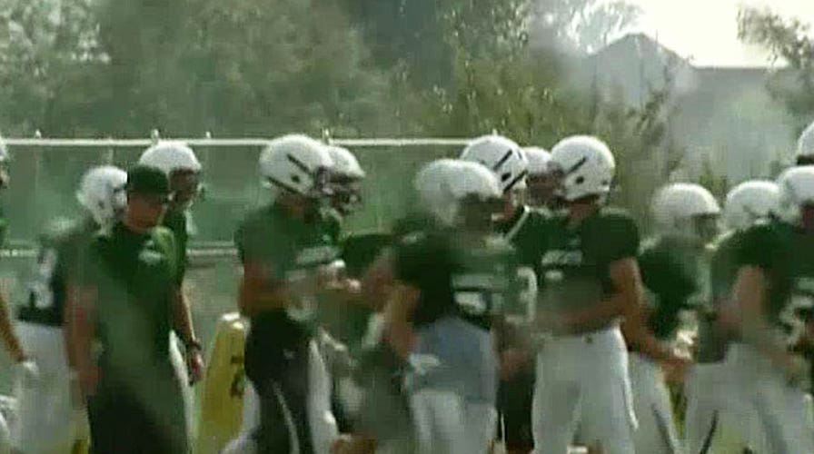 High school rejects football team's tribute to fallen heroes
