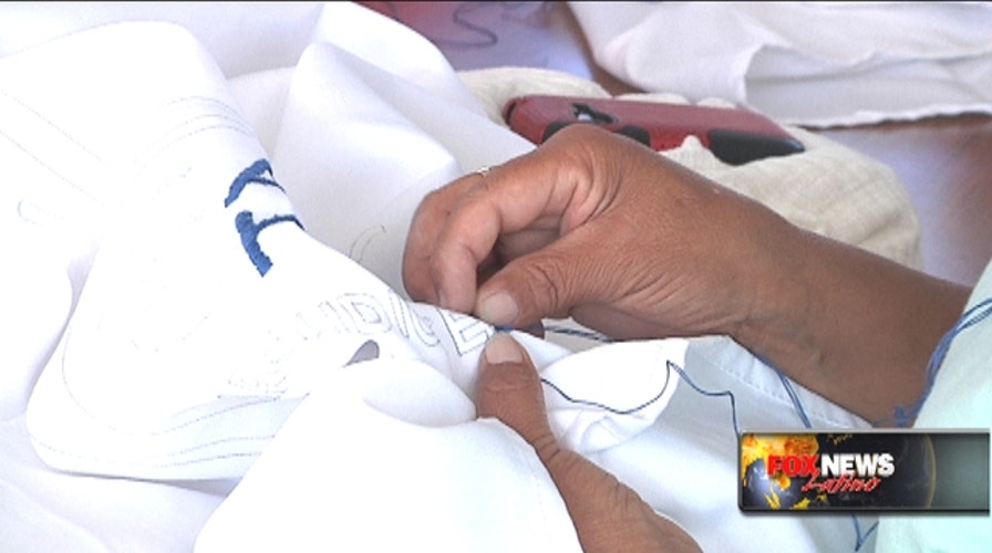 Undocumented women embroider Pope’s linens