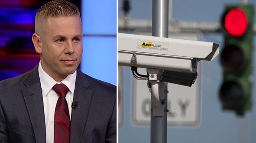 Man arrested for tampering with red light cameras speaks out