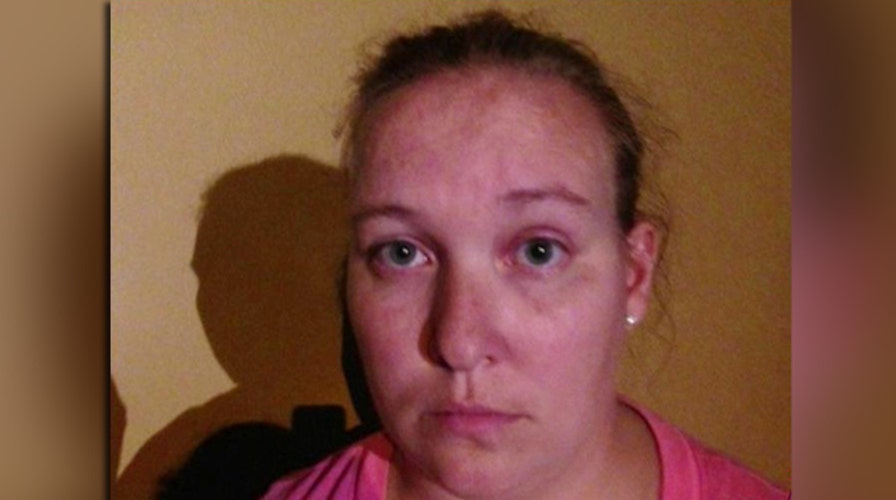 Woman in court for making false reports in Ill. manhunt 
