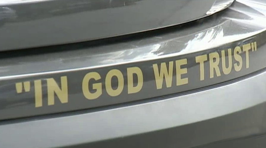 Police cars' 'In God We Trust' decals draw complaints 