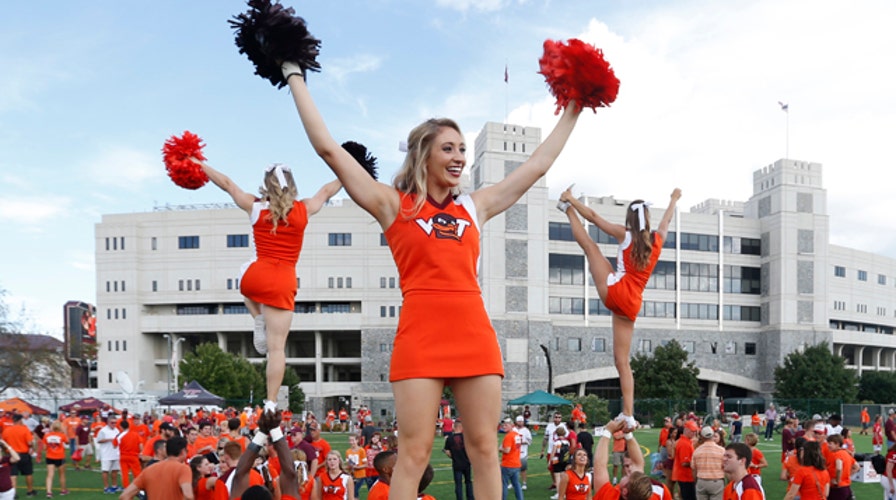 Is cheerleading a sport or an activity?