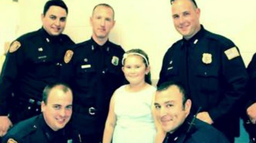 Cops escort child of fallen officer to father-daughter dance