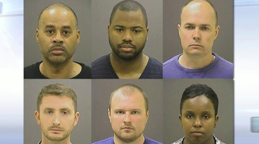 Judge rejects Baltimore cops' request to move trial