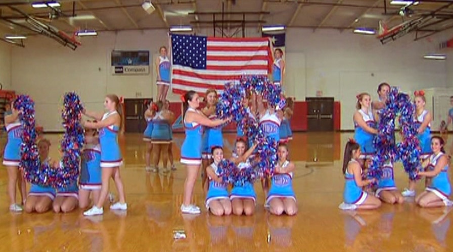 Cheer squad performs to sounds of 9/11 as tribute