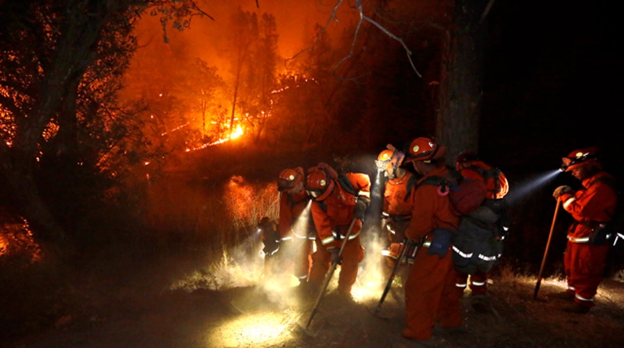 Firefighters battling massive blazes across California 