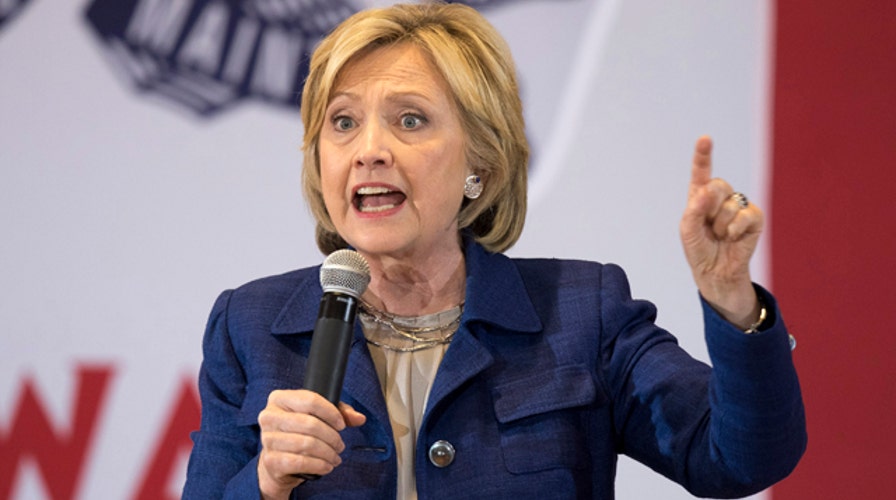 Clinton revamps campaign as poll numbers drop lower