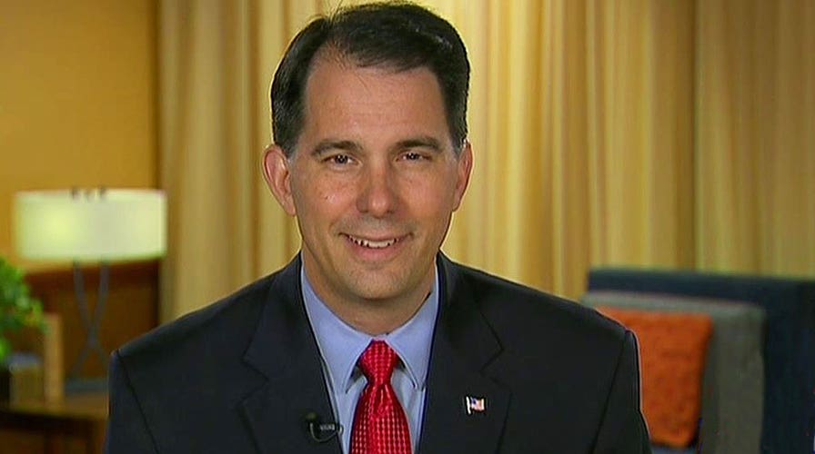 Gov. Scott Walker takes on Clinton, unions