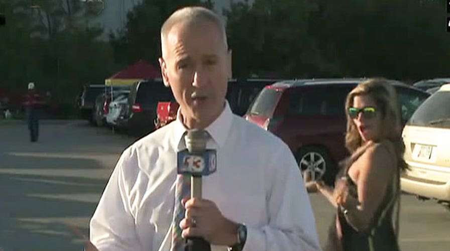 Kennedy's Topical Storm: Photobomber Fatale