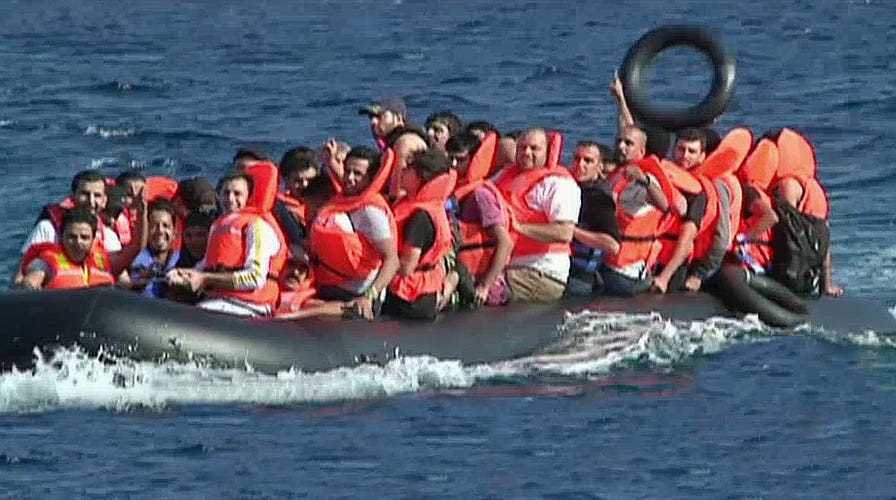 Boatloads of refugees arrive off the coast of Lesbos, Greece