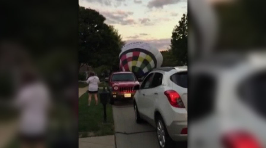 Hot air balloon makes surprise landing in middle of street